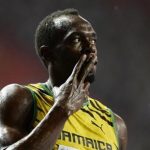 Bolt of Jamaica celebrates winning in the men's 100 metres final during the IAAF World Athletics Championships in Moscow