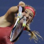 Azarenka of Belarus serves to Pfizenmaier of Germany during their first round match at the U.S. Open tennis championships in New York