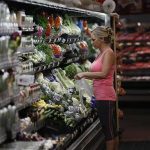 A customer shops at a Walmart Supercenter in Rogers