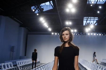 A model rehearses before a presentation of the Thakoon Spring/Summer 2014 collection during New York Fashion Week