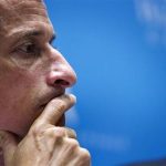 Weiner listens to fellow candidates speak at a debate held at the Museum of Tolerance in New York