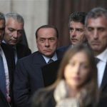 Italy's former PM Berlusconi arrives at the lower house of parliament in Rome