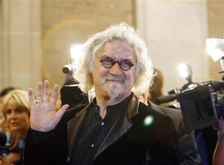 Billy Connolly waves at the premiere of Fido at the 31st Toronto International Film Festival in Toronto