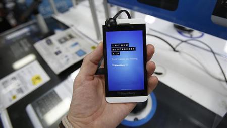A Blackberry Z10 smartphone is held up in Pasadena, California July 8, 2013. REUTERS/Mario Anzuoni