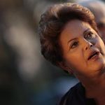 Brazil's President Dilma Rousseff reacts during a reception for the Brazilian Football delegation at the Alvorada Palace in Brasilia