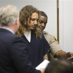 File photo of Tim Lambesis entering the courtroom for his arraignment in San Diego North County court in California