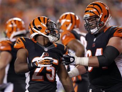 Bengals' Bernard celebrates his touchdown against the Steelers with Cook during the first half of play in their NFL football game at Paul Brown Stadium in Cincinnati