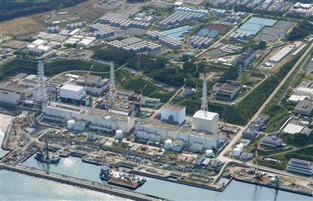 Aerial view of TEPCO's tsunami-crippled Fukushima Daiichi nuclear power plant and its contaminated water storage tanks in Fukushima