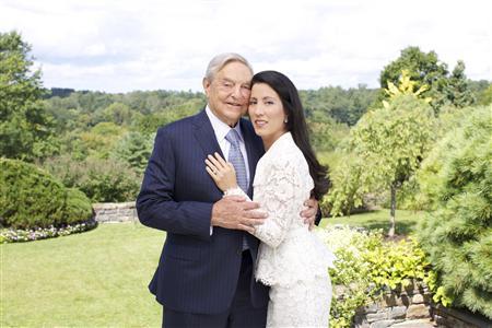 Handout of George Soros and Tamiko Bolton are shown as they prepare to attend the reception at MoMA in New York