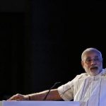 Gujarat's Chief Minister Modi speaks during the annual session of FICCI Ladies Organisation in New Delhi