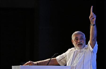 Gujarat's Chief Minister Modi speaks during the annual session of FICCI Ladies Organisation in New Delhi