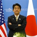 Japanese PM Abe waits for U.S. President Obama to arrive for their meeting at the G20 Summit in St. Petersburg