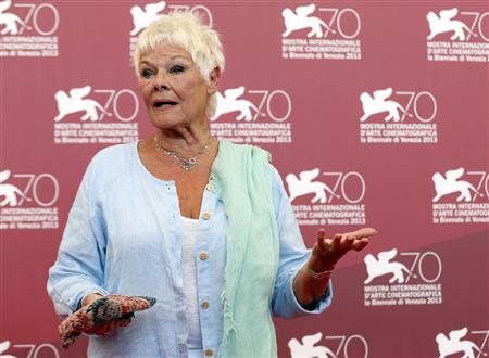Actress Dench poses during a photocall for the movie "Philomena", directed by Stephen Frears, during the 70th Venice Film Festival in Venice
