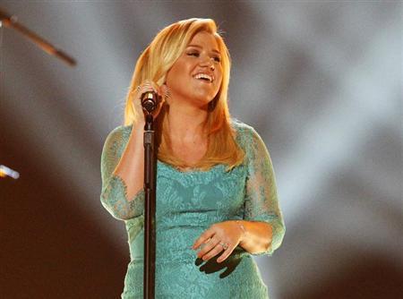 Kelly Clarkson performs "Don't Rush" during the 48th ACM Awards in Las Vegas