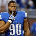 Detroit Lions' Ndamukong Suh stands on the field during warms-ups of their NFL football game against the Chicago Bears in Detroit