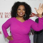 Actress Oprah Winfrey, a cast member of the film "Lee Daniels' The Butler", poses at the film's premiere in Los Angeles