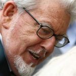 Entertainer Rolf Harris arrives at Westminster Magistrates Court, to face sex offence charges, in central London