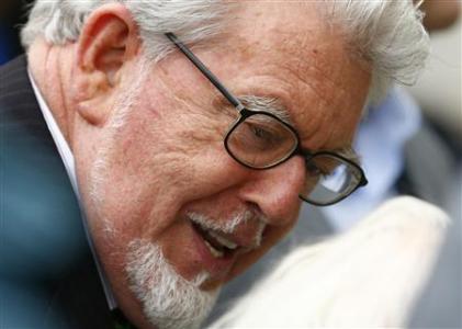 Entertainer Rolf Harris arrives at Westminster Magistrates Court, to face sex offence charges, in central London