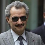 File photograph shows Prince Alwaleed bin Talal leaving the High Court in London