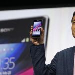 Sony Corp's President and Chief Executive Officer Hirai presents a new Sony Xperia Z1 smartphone during it's world premier at the IFA consumer electronics fair in Berlin