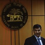 Rajan, newly appointed governor of RBI, arrives for a news conference at the bank's headquarters in Mumbai