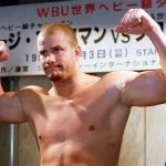 HIV infected heavyweight boxer and former WBO champion Tommy Morrison of the United States poses during a weigh-in in Tokyo in this file photo
