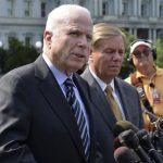 U.S. Senator McCain (R-AZ) makes remarks to the media as U.S. Senator Lindsey Graham (R-SC) listens, after meeting with U.S. President Obama at the White House in Washington