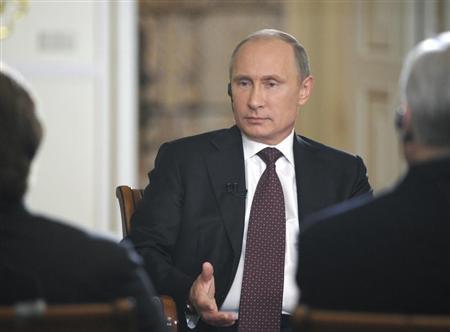 Russian President Putin speaks during an interview at the Novo-Ogaryovo state residence outside Moscow
