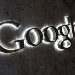 A Google logo is seen at the entrance to the company's offices in Toronto