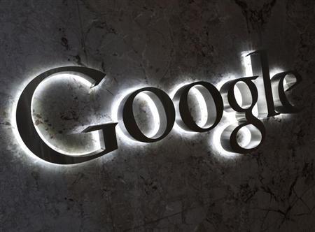 A Google logo is seen at the entrance to the company's offices in Toronto