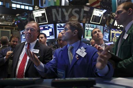 Traders work on the floor of the New York Stock Exchange