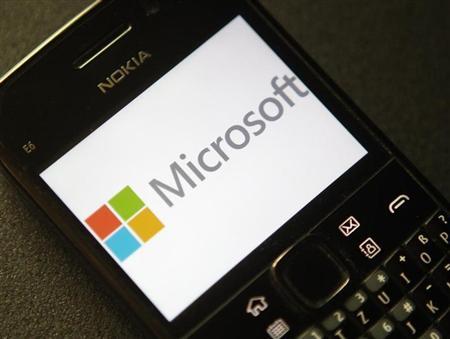 A photo illustration shows the Microsoft logo displayed on a Nokia phone in Vienna