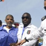 Abdullah al-Senussi (in blue)