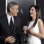 Actors George Clooney and Sandra Bullock arrive for the film premiere of "Gravity" in New York