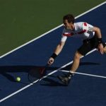 Murray of Britain chases down a return to Wawrinka of Switzerland at the U.S. Open tennis championships in New York