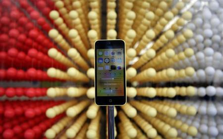 Apple's new iPhone 5C is displayed at an Apple shop in Tokyo's Ginza shopping district