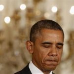 U.S. President Obama pauses while he speaks about immigration reform in the East Room at the White House in Washington
