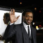 Cast member Ejiofor waves at a special screening of "12 Years a Slave" at the Directors Guild of America in Los Angeles