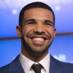 Drake smiles during an announcement that the Toronto Raptors will host the NBA All-Star game in Toronto