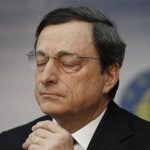 ECB President Draghi reacts during the monthly news conference in Frankfurt