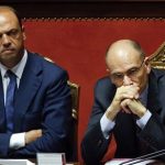 File photo of Italy's Prime Minister Letta looking on next to Interior Minister Alfano during a vote session at the Senate in Rome