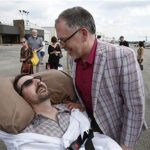 Jim Obergefell, right, and John Arthur