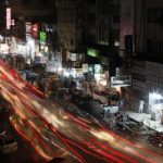 A view is seen of a busy street in Karachi