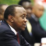 Kenyan President Kenyatta speaks to Chinese Premier Li during their meeting in Beijing