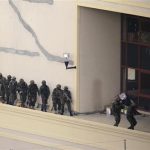 Kenya Defence Forces soldiers comb the rooftop of the Westgate shopping mall in Nairobi