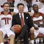 Louisville's Luke Hancock, left, head coach Rick Pitino, center, and Russ Smith