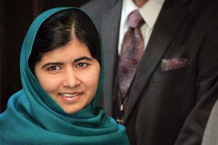 Pakistan's Malala Yousafzai arrives for a photo opportunity before speaking at an event in New York