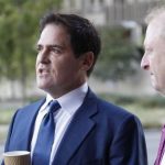 Cuban, the billionaire owner of the NBA's Dallas Mavericks, speaks with the media while his attorney Best looks on prior to entering U.S District Court for the opening day of his insider trading trial in Dallas