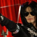 U.S. pop star Michael Jackson gestures during a news conference at the O2 Arena in London