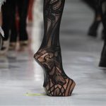 Models present creations by designer Somarta during a Fashion Week show in Jakarta